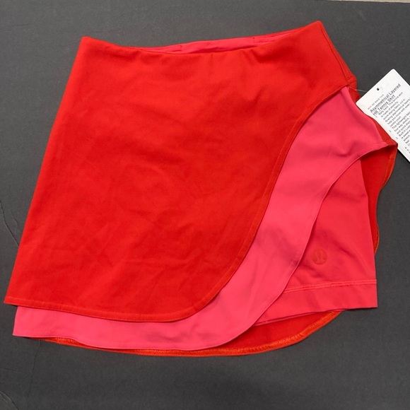 lululemon athletica Dresses & Skirts - lululemon Tennis Skirt Size 2 Red Pink Asymmetrical Layered High Rise Skirt NWT
